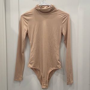Cream long sleeve turtle neck bodysuit